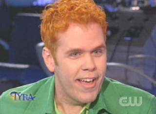Illustration for article titled Tyra Unveils Real Hair; Interviews Evil Leprechaun